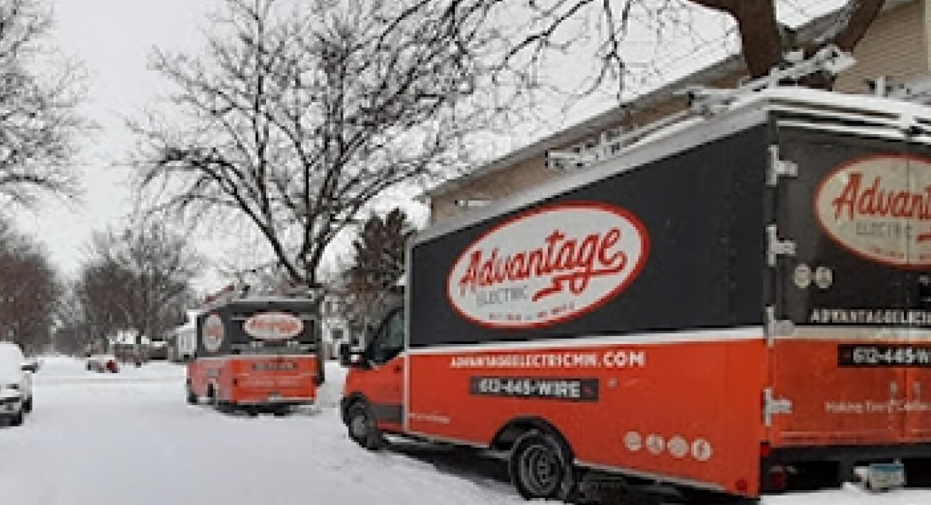 Advantage Electric van parked on street in winter